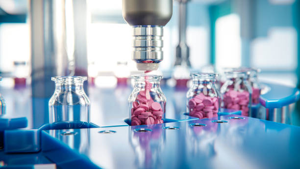 jar filling with red tablets on a packaging line in a pharmaceutical factory - 3d illustration - farmaceutische fabriek stockfoto's en -beelden