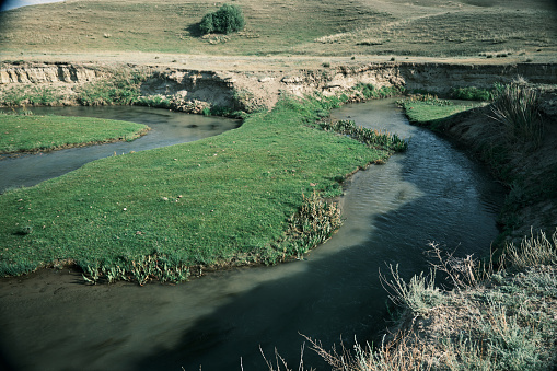 Curved river in foothills