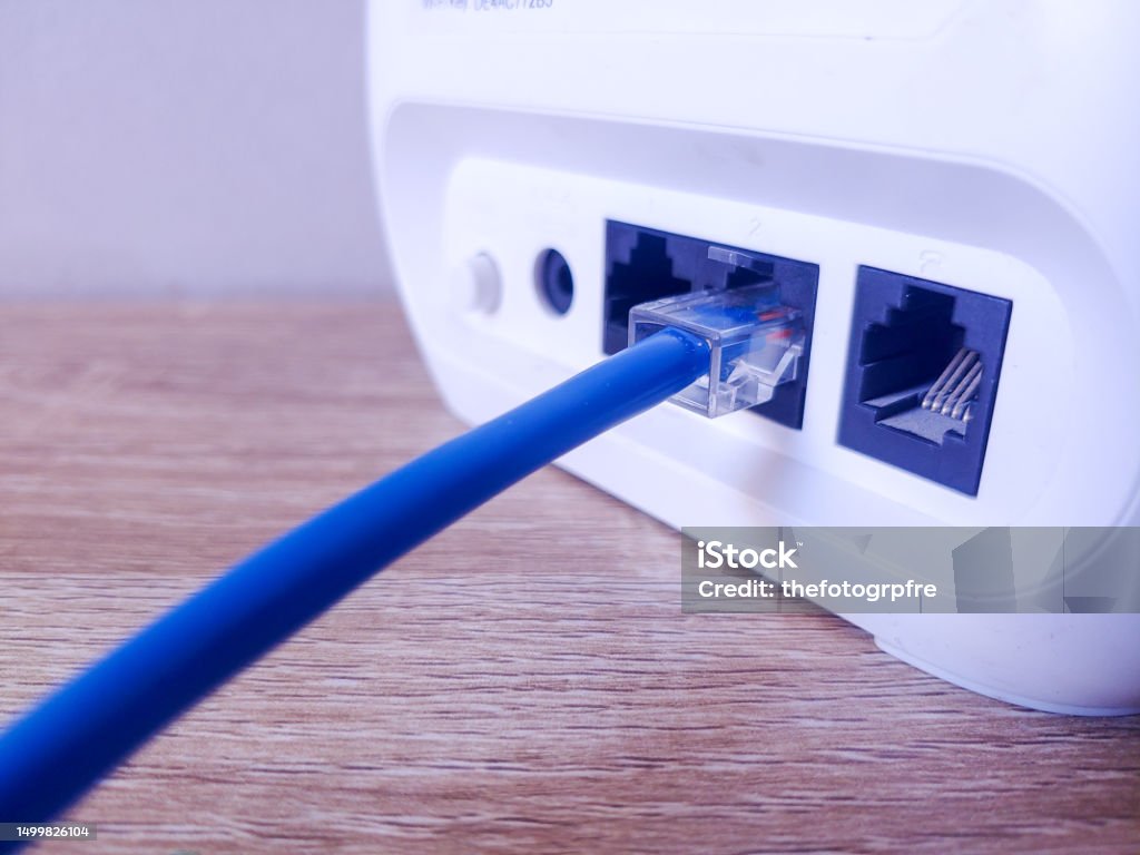 Internet Cable Output Internet Cable Connected To A Modem Stock Photo - Download Image Now ...