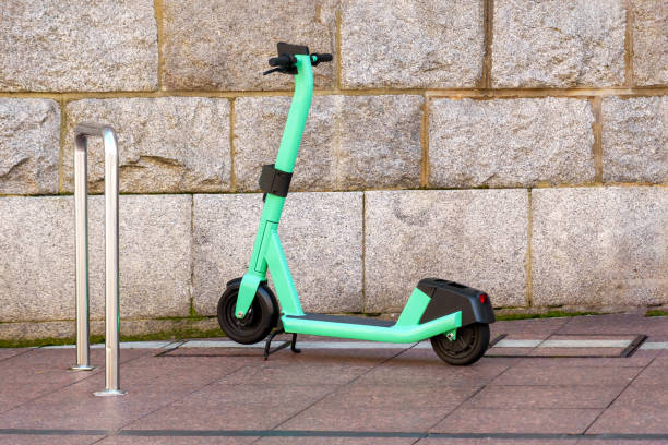 istock One electric battery scooter in street parking with chrome frame 1499829236
