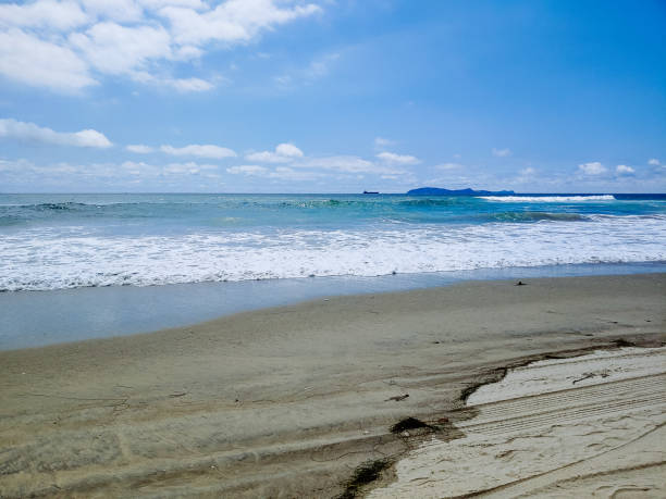 istock Beach with islands in the background 1499830915