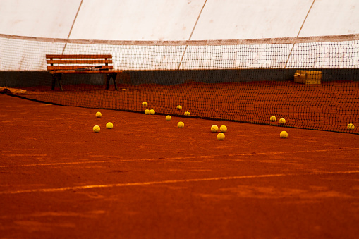 Beach tennis ball next to the court marking line