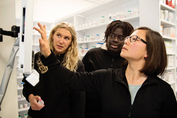 istock Team of diverse college students in pharmacy. 1499835067