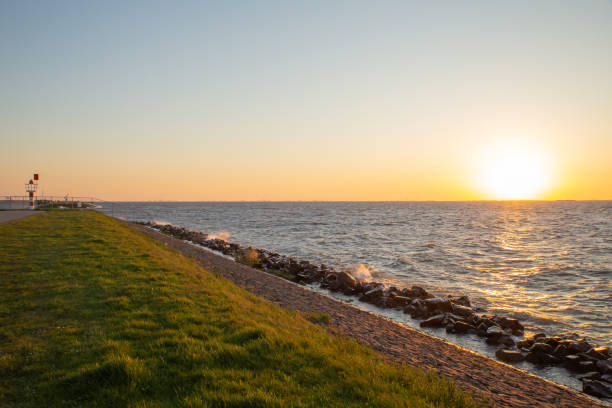 istock Sea sunset with waves hitting the seashore 1499836944