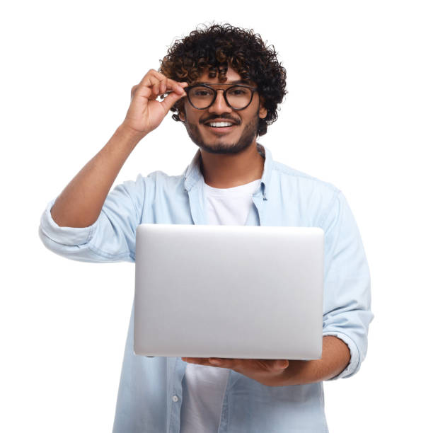 istock Smiling man with laptop on white background 1499840438