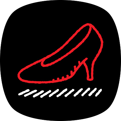 Vector illustration of a chalk styled, hand drawn red high heel shoe against a black background.