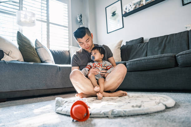 istock Young Korean Father at Home with toddler son 1499851823