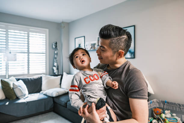 istock Young Korean Father at Home with toddler son 1499852053