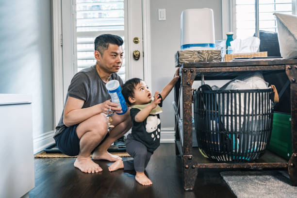 istock Young Korean Father at Home with toddler son 1499852143