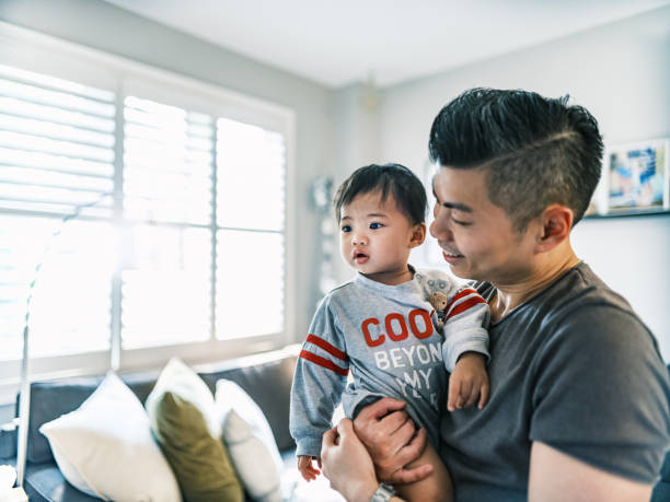 istock Young Korean Father at Home with toddler son 1499853191