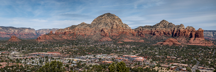 Panoramic image of the rock formations and vegetation found on the hiking trails in Sedona, Arizona.