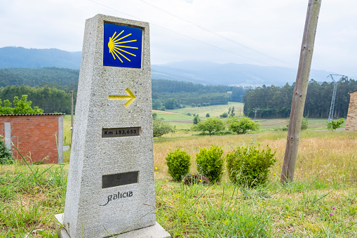 Signpost of the Way Saint James, marks shells for pilgrims to Compostela Cathedral in Galicia