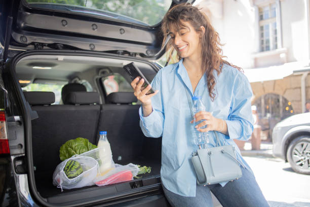 istock Woman is returning from shopping 1499861576