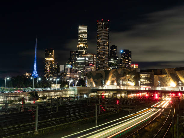 istock Urban skyline and trains at night 1499864830