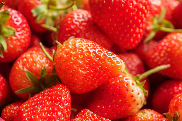 istock Fresh organic red strawberry fruit background 1499867462