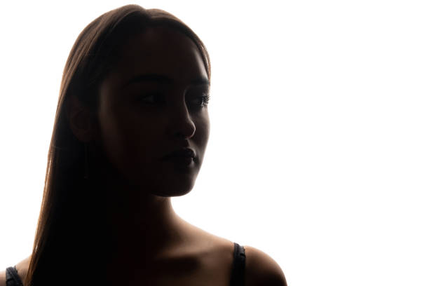 istock Beauty silhouette backlight portrait woman face 1499867633