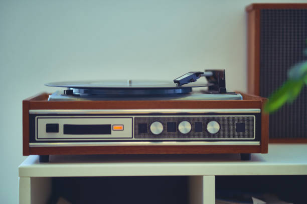 istock Vintage retro vinyl turntable with record 1499876027