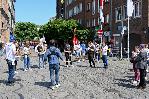 Quimper, Brittany/France- July 28, 2019 : The annual Festival de Cornouaille in the city of Quimper.  Traditional band of musicians play folk music.