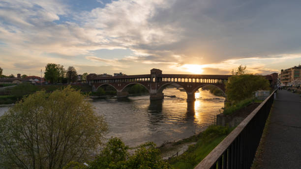 istock Pavia covered bridge over Ticino river at beautiful sunset 1499877583