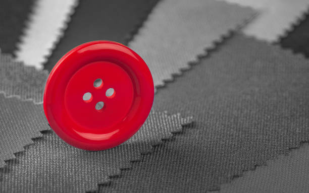 istock red button in vintage style on black and white background 1499877590