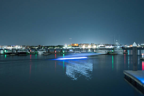 istock light trail of boat in harbor 1499885338
