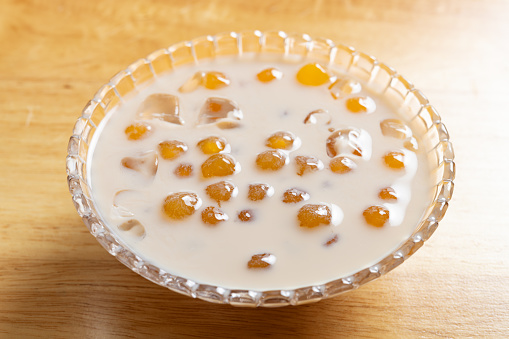 angle view bowl of milktea flavor syrup with tapioca balls