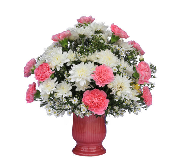 istock Fresh summer flower arrangement in pink pot container isolated on white background 1499888888