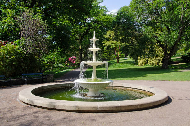 istock Four tier water fountain in a park 1499912010