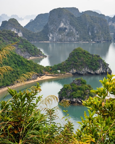 An aerial view of Halong Bay in Vietnam, Southeast Asia with mountains and awe-inspiring cliffs