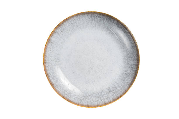 istock Table setting with vintage empty white plate on rustic wood.  Isolated on white background. 1499927566