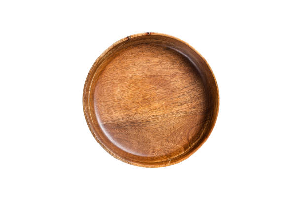 istock Table setting with vintage empty wooden plate on rustic wood. Isolated on white background. 1499927605