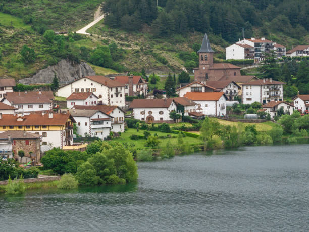 istock Town next to a reservoir. Eugi, Navarra 1499928716