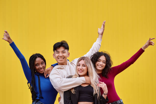 istock Happy multi-ethnic friends posing together. 1499932047