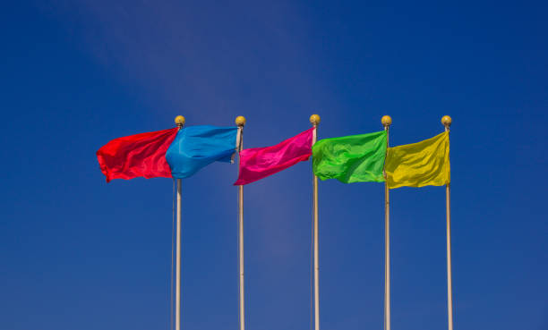 istock Colorful multicolored flags against blue sky 1499932393