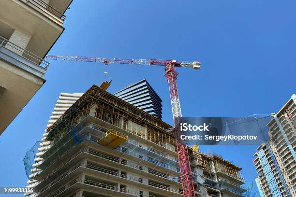 The Problem Of Dense Development Of Modern Cities Stock Photo - Download Image Now - Architecture, Blue, Building Exterior