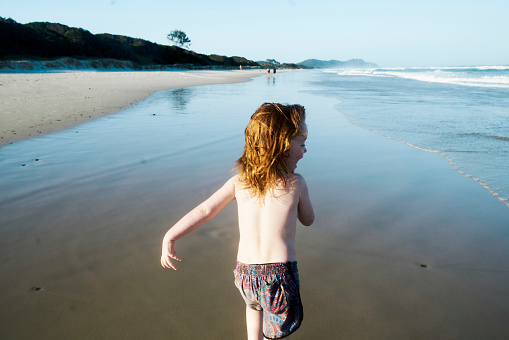 Active Australian Kid Playing on a Beach Holiday