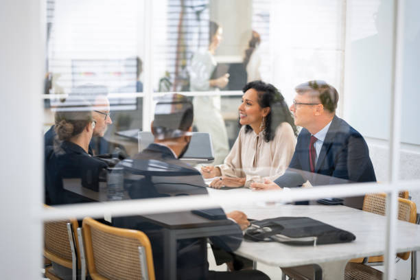 istock Business people talking in boardroom 1499938018