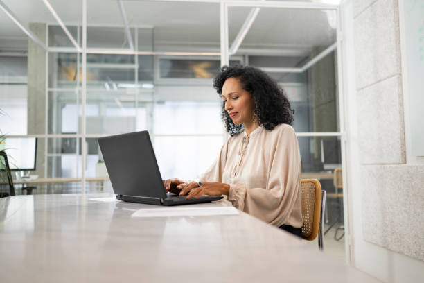 istock Businesswoman using laptop 1499938068