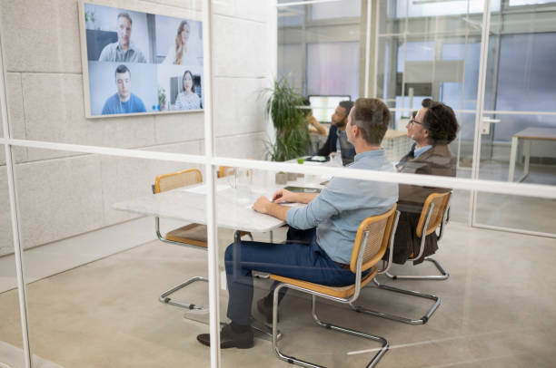 istock Business people attending video conference 1499938069
