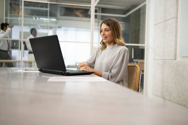 istock Businesswoman looking laptop 1499938075