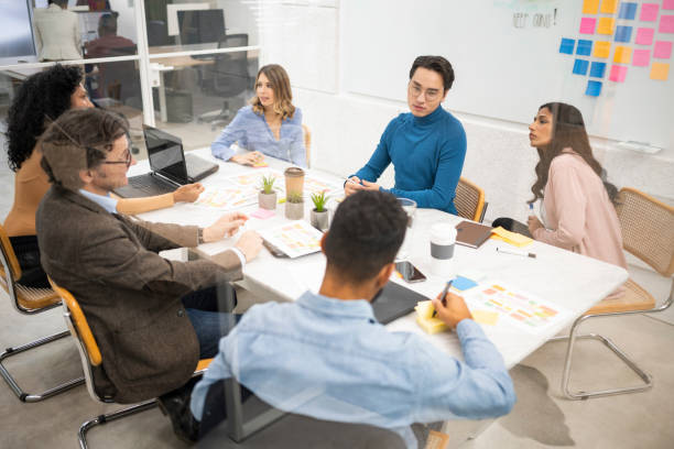 istock Business people talking in boardroom 1499938101