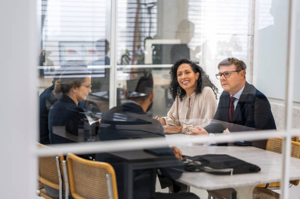 istock Business people talking in boardroom 1499938113