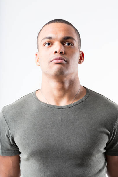 istock Strong, short-haired man, military stance, looking up 1499941413