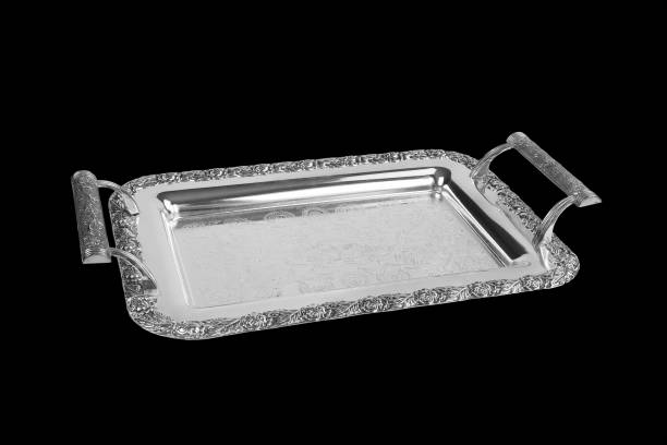 istock silver tray with handles isolated on black background with clipping path. 1499945630