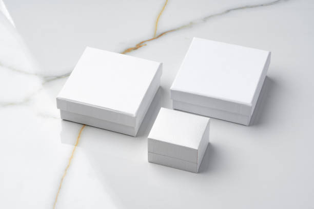 istock White jewelry box on a white marble background 1499945954