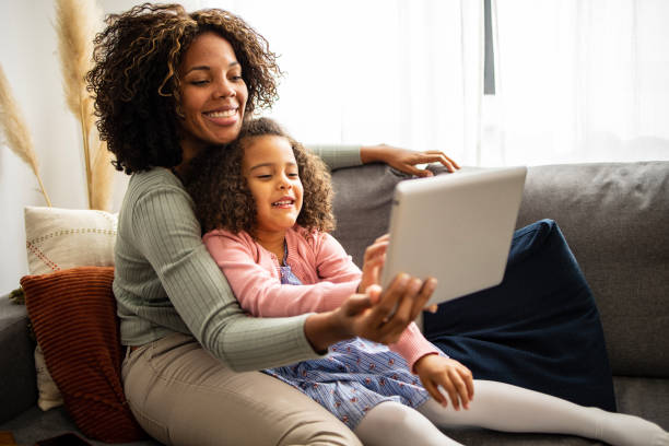 istock Using digital tablet to watch videos online 1499946565