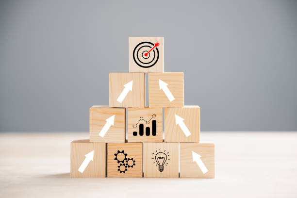 istock Wooden blocks with Target icon on top 1499947811