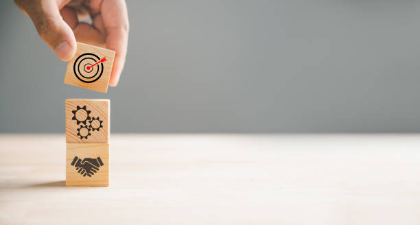 istock Wood block stacking meticulously arranged by hand 1499947815