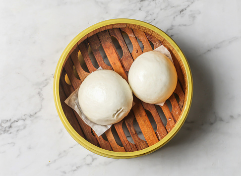 lotus paste bun dumpling bun momo served dish isolated on background top view of chinese and thai food