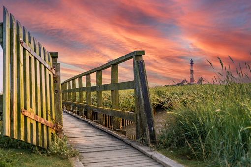 Wooden bridge at Westerhever lighthouse in Germany